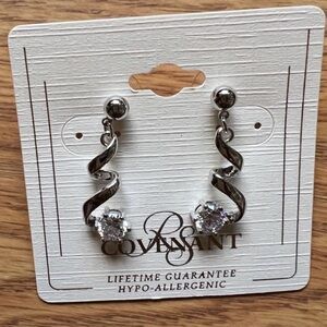 Ornate Silver Scroll Earrings lifetime warranty. See photo